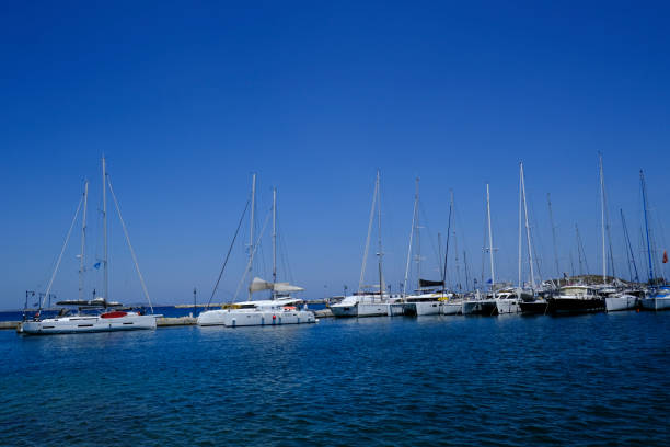 Waterfront marina with yachts and sailboats in Naxos, Greece on July 10, 2023.