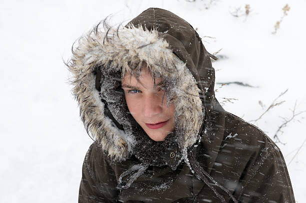 istock Norwegian boy in snow storm dressed for mountain skiing 157223132