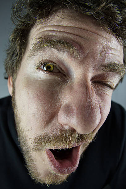 istock Right eye closed and mouth open 157227079