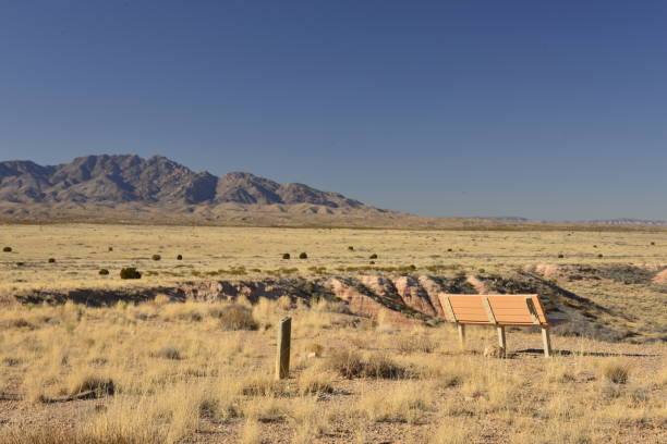 istock Park Bench With View Of Mountain Against Deep Blue Sky 1572276510