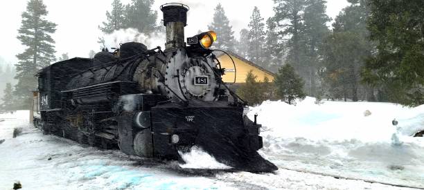 istock Steam Powered Locomotive in the Snow 1572281352