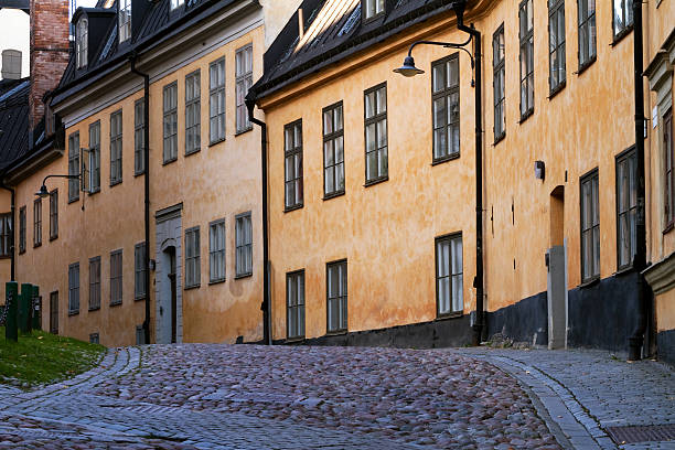 Old street in Sodermalm, Stockholm. Cobblestone street with old buildings in stockholm south area. sodermalm photos stock pictures, royalty-free photos & images