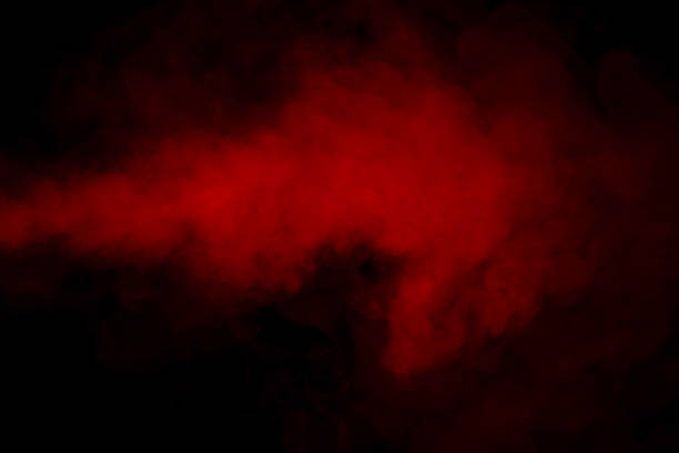 istock Orange and red steam on a black background. 1572307871