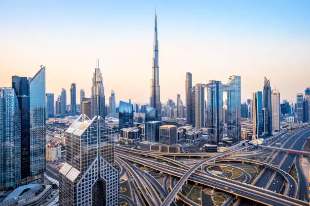 the skyline of dubai during sunrise