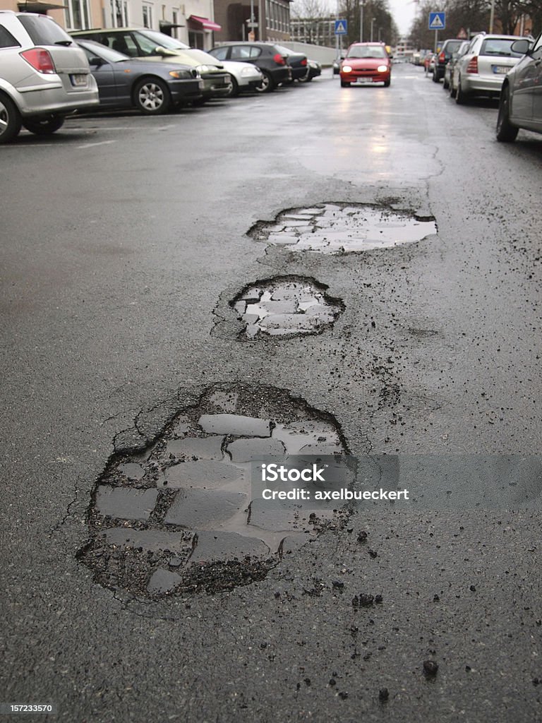 road daños/potholes - Foto de stock de Bache libre de derechos