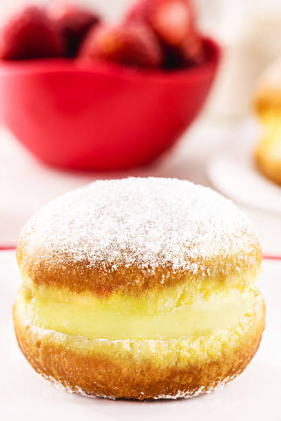 istock sweet bread with sugar cream and egg, called Brazilian fried donut called bakery dream, in germany it is called Berliner Eierlikör or Kreppel-Eierlikör in Germany, 1572379245