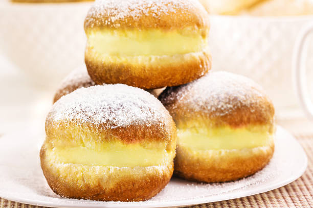 istock sweet bread with sugar cream and egg, called Brazilian fried donut called bakery dream, in germany it is called Berliner Eierlikör or Kreppel-Eierlikör in Germany, 1572379268