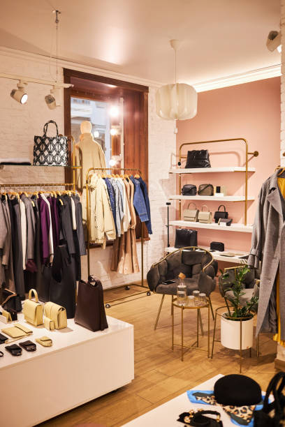 istock Empty clothing boutique with clothes and accessories 1572391422