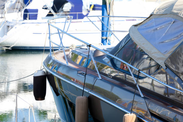 istock Leisure motor boat harbor buoy ram protection 1572392532