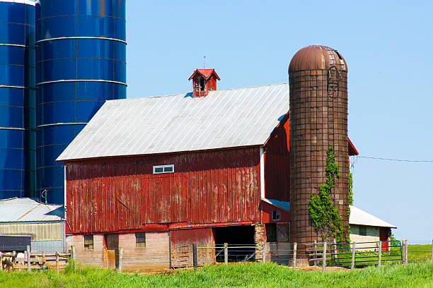 istock Traditional American Red Barn With Blue Sky 157240934