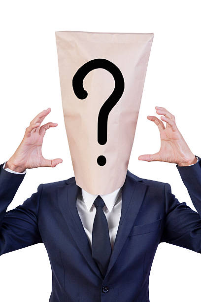 istock businessman cover his head with bag 157241284