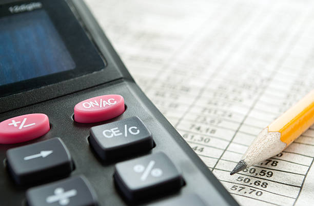 istock calculator and pen on the table 157242613