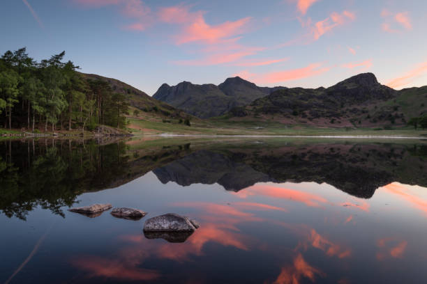 istock Blea Tarn Sunrise Reflections, Lake District, UK. 1572442805