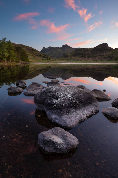 istock Summer Sunrise at Blea Tarn in the Lake District. 1572443360