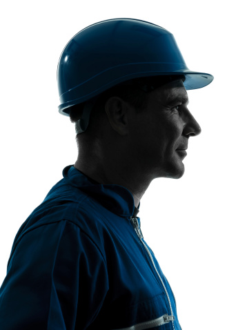 one caucasian man construction worker smiling silhouette portrait in studio on white background