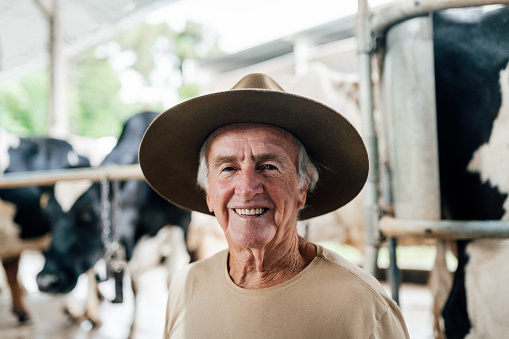 Smiling dairy farmer