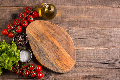 Wooden board food background. Ingredients for cooking on table. Banner. Layout.