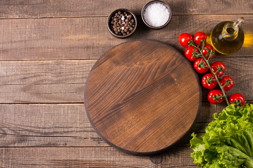 Wooden board food background. Ingredients for cooking on table. Banner. Layout.