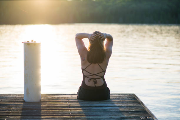 istock Relaxing at Sunset by the Lake is What Summer is About 1572492026