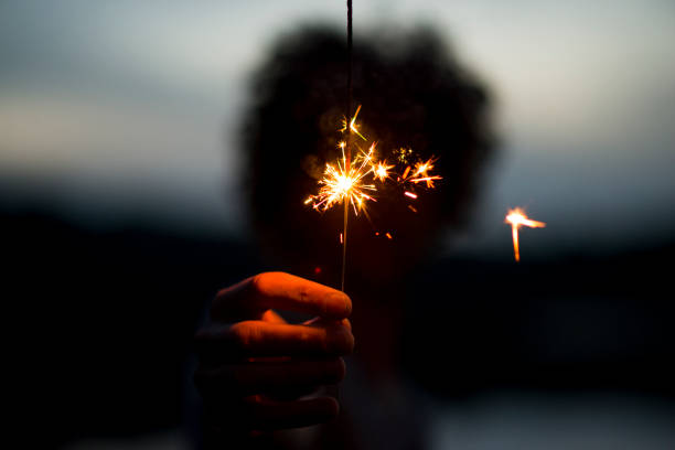 istock Sparklers at a Summer Party 1572497390