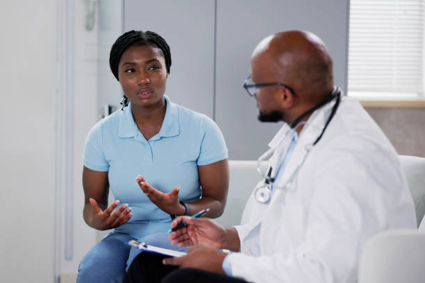istock African Doctor Talking To Patient 1572523120