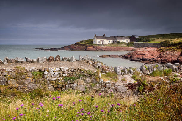 iew of the village, on a rainy day, in the Isle of Skye, Inner Hebrides, Scotland, UK