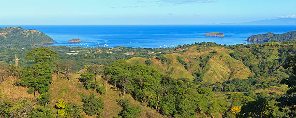 Playa del Coco and Ocotal from Cerro Ceiba Panoramic view of Playa del Coco and Ocotal on the Pacific from the heights on Cerro Ceiba in Guanacaste, Costa Rica el coco stock pictures, royalty-free photos & images