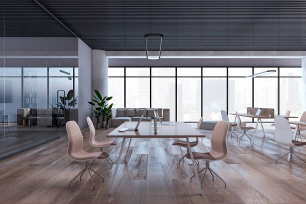 istock Luxury open space designer office interior with furniture, panoramic windows with city view, wooden flooring and various objects. 3D Rendering. 1572584882