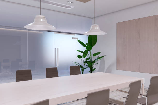 istock Perspective view of modern empty boardroom interior with office desk and chairs, matte glass wall and wooden floor. 3D Rendering 1572587532