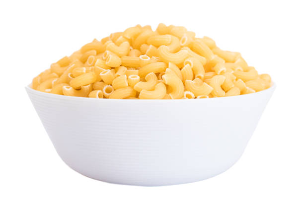 istock Uncooked Chifferi Rigati Pasta in White Cup Isolated on White Background 1572597194
