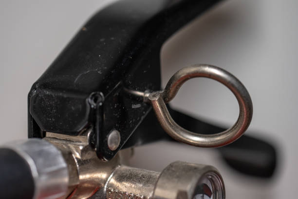 istock Safety pin of a fire extinguisher. 1572606437