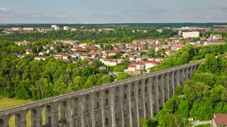 Backwards Drone Shot of Chaumont, France Revealing Viaduct