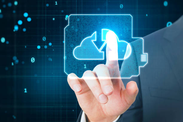 istock Data exchange and cloud service concept with man hand finger on digital touch screen with blue clous symbol with oppositely directed arrows in processor form on dark technological background 1572617533