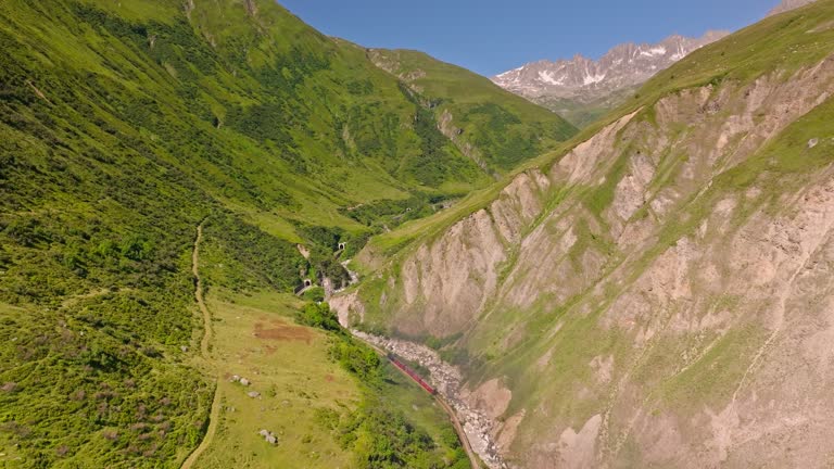 Steam Train in Swiss Mountain Pass - Aerial