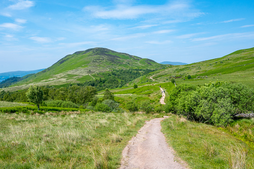 Achintee / UK - August 24 2019: Ben Nevis is the highest mountain in Britain. The Mountain Track to the summit (also known as the Ben Path, the Pony Track or the Tourist Route) remains the simplest and most popular route of ascent. It begins at Achintee on the east side of Glen Nevis about 2 km (1.5 miles) from Fort William town centre, at around 20 metres above sea level.