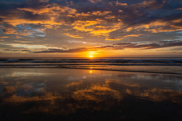 istock Moody Beach Sunset in Costa Rica 1572653535