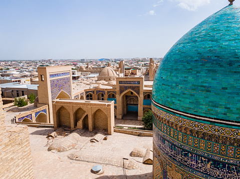 Bukhara, Uzbekistan Aerial view of Mir-i-Arab Madrasa Kalyan minaret. Translation on mosque: \
