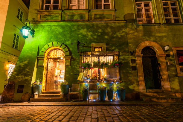 Street cafe at night in the Old Town of Warsaw, Poland