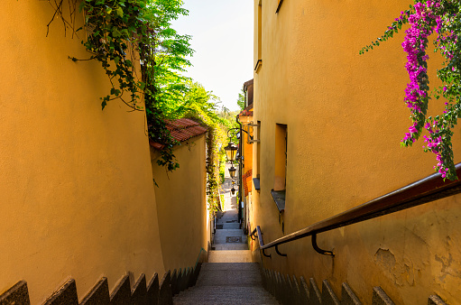 Narrow street with staircase in Old Town of Warsaw, Poland