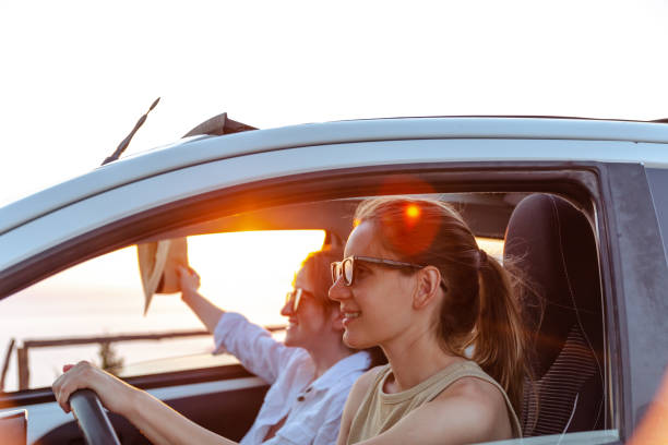 istock Girls on a summer road trip 1572736117
