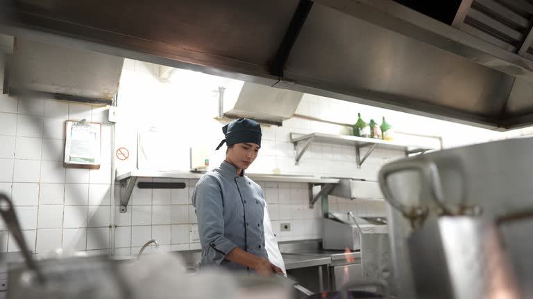 Chef cooking in a commercial kitchen