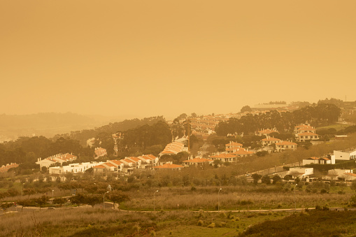 Yellow sky from dust blown in from Sahara. Dust storms are relatively uncommon, but not unknown in Portugal. They have become more intense and more frequent in recent time. This event in March 2022 lasted for 2 days.