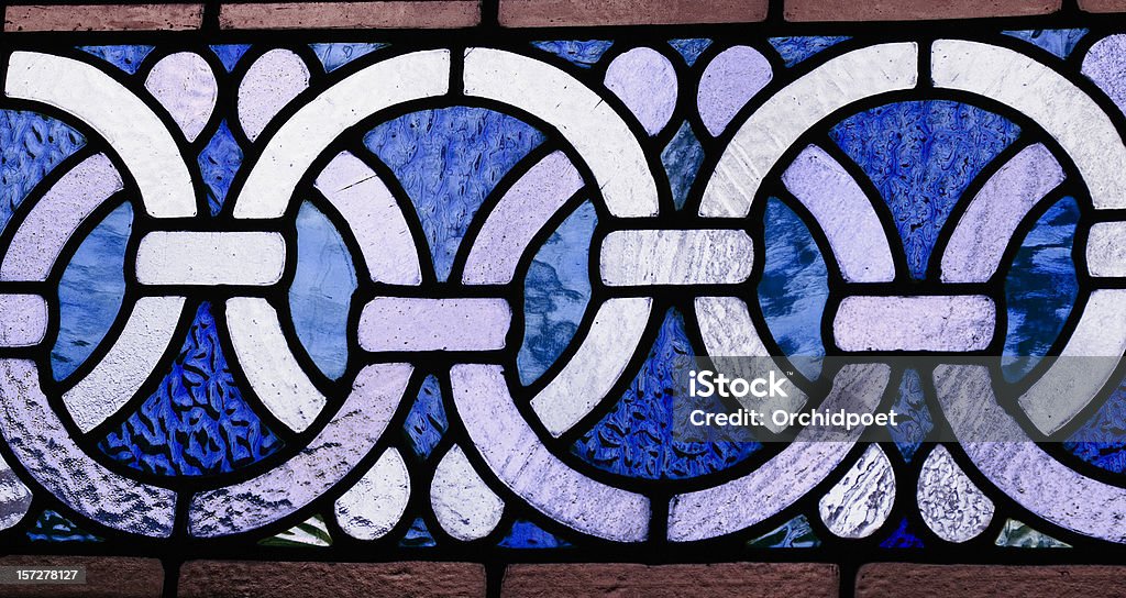 Celtic border in stained glass Celtic border in stained glass, in blue and white colors Abstract Stock Photo