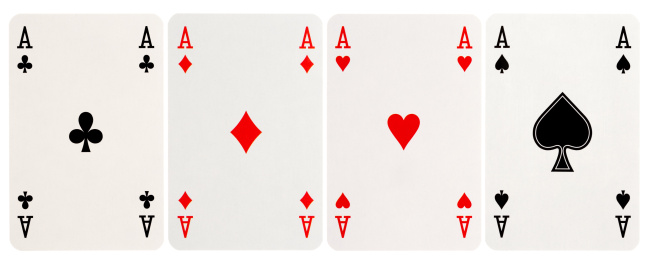 Macro shot of an old Jack of clubs playing card (knave) isolated on white background. Cracks, peeled edges and noticeable wear visible on the surface. (Adobe RGB)