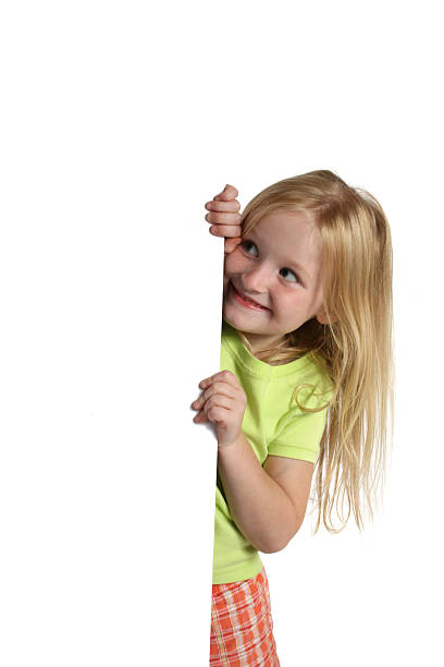 istock young girl holding sign 157278316