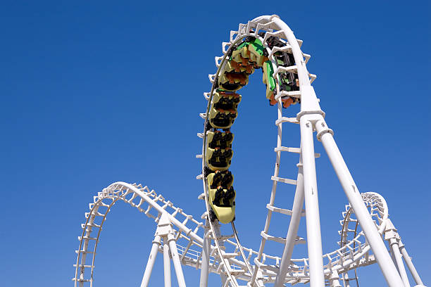 Roller Coaster Roller coaster with clear blue sky fairground ride stock pictures, royalty-free photos & images