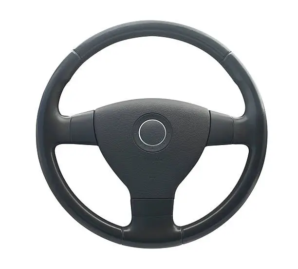 Photo of Grey steering wheel with circle in middle on horn