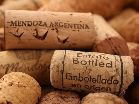 Selection of corks from argentinian wines. The writing is generic meaning the wine was bottled in the same place it was produced. Shallow depth of field, focus on front cork
