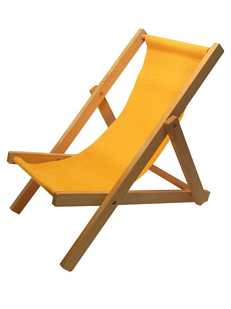 istock Yellow beach chair isolated on white 157279472