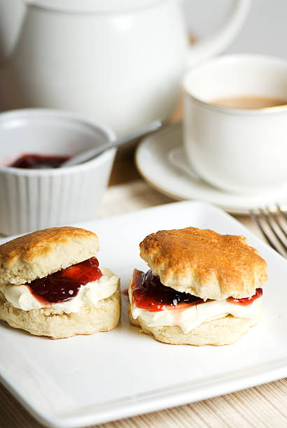 Sweet cream teas served on delicate white China stock photo